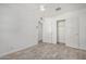 Charming bedroom with wood-look floors, ceiling fan, and double-door closet at 1818 E Monterey Way, Phoenix, AZ 85016