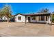 Updated single story home with carport and front yard at 1818 E Monterey Way, Phoenix, AZ 85016