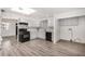 Remodeled kitchen with white cabinets, new flooring, and patterned backsplash at 1818 E Monterey Way, Phoenix, AZ 85016