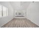 Spacious living room with bay window and vinyl plank flooring at 1818 E Monterey Way, Phoenix, AZ 85016