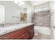 Bathroom boasts granite countertops and a bathtub at 30124 W Mckinley St, Buckeye, AZ 85396