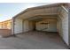 Metal carport provides covered parking area at 30124 W Mckinley St, Buckeye, AZ 85396