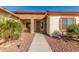 Front entry with stone accents and a walkway at 30124 W Mckinley St, Buckeye, AZ 85396