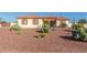 Single-story home with desert landscaping and a three-car garage at 30124 W Mckinley St, Buckeye, AZ 85396