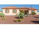 One-story house featuring a stone facade and cactus accents at 30124 W Mckinley St, Buckeye, AZ 85396