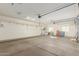 Garage with storage shelving and flooring at 30124 W Mckinley St, Buckeye, AZ 85396