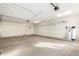 Spacious garage with storage shelving and flooring at 30124 W Mckinley St, Buckeye, AZ 85396