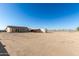 Single story home with large backyard and outbuildings at 30124 W Mckinley St, Buckeye, AZ 85396