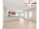 Open kitchen features granite countertops and dark wood cabinets at 30124 W Mckinley St, Buckeye, AZ 85396