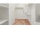 Large walk-in closet with double hanging rods and shelving at 30124 W Mckinley St, Buckeye, AZ 85396