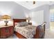 Bright bedroom with sleigh bed and hardwood floors at 3291 E Cherrywood Pl, Chandler, AZ 85249