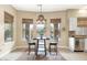 Bright breakfast nook with a table and chairs, overlooking the backyard at 3291 E Cherrywood Pl, Chandler, AZ 85249