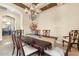 Elegant dining room with a chandelier and large table at 3291 E Cherrywood Pl, Chandler, AZ 85249