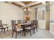 Formal dining room with chandelier and hardwood floors at 3291 E Cherrywood Pl, Chandler, AZ 85249