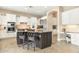 Spacious kitchen with granite countertops, stainless steel appliances, and an island at 3291 E Cherrywood Pl, Chandler, AZ 85249
