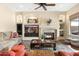 Gathering room with a fireplace and built-in shelving at 3291 E Cherrywood Pl, Chandler, AZ 85249