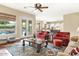 Comfortable living room with a fireplace and access to the backyard at 3291 E Cherrywood Pl, Chandler, AZ 85249