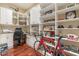 Spacious home office with ample storage and hardwood floors at 3291 E Cherrywood Pl, Chandler, AZ 85249