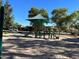 Community playground with shaded play structure and slides at 3291 E Cherrywood Pl, Chandler, AZ 85249