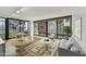 Bright living room with hardwood floors, large windows, and city views at 4808 N 24Th St # 531, Phoenix, AZ 85016