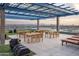 Rooftop deck with city views, tables, chairs and lounge chairs at 4808 N 24Th St # 531, Phoenix, AZ 85016