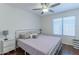 Bright bedroom with a king-size bed and plenty of natural light at 7439 W Tonopah Dr, Glendale, AZ 85308