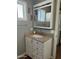 Bathroom features a vanity with granite countertop and mirrored medicine cabinet at 7750 E Broadway Rd # 776, Mesa, AZ 85208