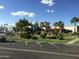 Carriage Manor Resort clubhouse with lush landscaping at 7750 E Broadway Rd # 776, Mesa, AZ 85208