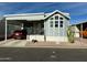 Quaint single wide mobile home with carport at 7750 E Broadway Rd # 776, Mesa, AZ 85208