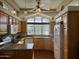 Bright kitchen with wood cabinets, granite countertops, and updated appliances at 7750 E Broadway Rd # 776, Mesa, AZ 85208