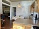 Kitchen with a breakfast nook and view into the living room at 7750 E Broadway Rd # 776, Mesa, AZ 85208