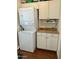 Laundry room with stackable washer/dryer, cabinets, and extra counter space at 7750 E Broadway Rd # 776, Mesa, AZ 85208