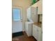 Convenient laundry area with stackable washer/dryer and exterior access at 7750 E Broadway Rd # 776, Mesa, AZ 85208