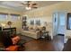 Living room offers hardwood floors and comfortable seating at 7750 E Broadway Rd # 776, Mesa, AZ 85208