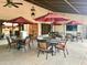 Community patio with shaded seating and tables at 7750 E Broadway Rd # 776, Mesa, AZ 85208