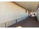 Covered patio or porch area adjacent to the mobile home at 7807 E Main St # Cc-66, Mesa, AZ 85207