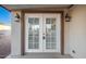 White double doors leading to a patio at 8103 E Southern Ave # 311, Mesa, AZ 85209