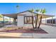 Single-story home with carport and landscaped yard at 8103 E Southern Ave # 311, Mesa, AZ 85209