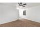 Spacious bedroom with neutral carpeting and ceiling fan at 8103 E Southern Ave # 319, Mesa, AZ 85209