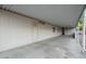 Long covered carport with access to the home's entrance at 8103 E Southern Ave # 319, Mesa, AZ 85209