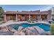 Stunning pool area with large rocks and a spacious patio at 9290 E Thompson Peak Pkwy # 430, Scottsdale, AZ 85255