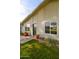 House exterior with a dark door and red pots at 1026 N 85Th Pl, Scottsdale, AZ 85257