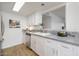 Updated kitchen featuring granite counters and stainless steel appliances at 1026 N 85Th Pl, Scottsdale, AZ 85257