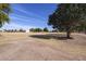 View of park with large trees and open grassy area at 1026 N 85Th Pl, Scottsdale, AZ 85257