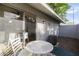 Private patio with table and chairs, great for relaxing at 1026 N 85Th Pl, Scottsdale, AZ 85257