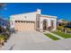 Single-story home with light-colored stucco and a two-car garage at 20784 W Minnezona Ave, Buckeye, AZ 85396