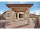 Covered patio with brick pavers and a pergola at 2764 N Sterling St, Mesa, AZ 85207