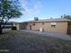 Back of house showing a concrete patio at 402 W Greenwich Rd, Kearny, AZ 85137