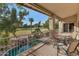 Spacious patio overlooking a golf course and pool at 5729 W Abraham Ln, Glendale, AZ 85308