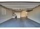 Bright and spacious garage with overhead storage at 10535 E Palladium Dr, Mesa, AZ 85212